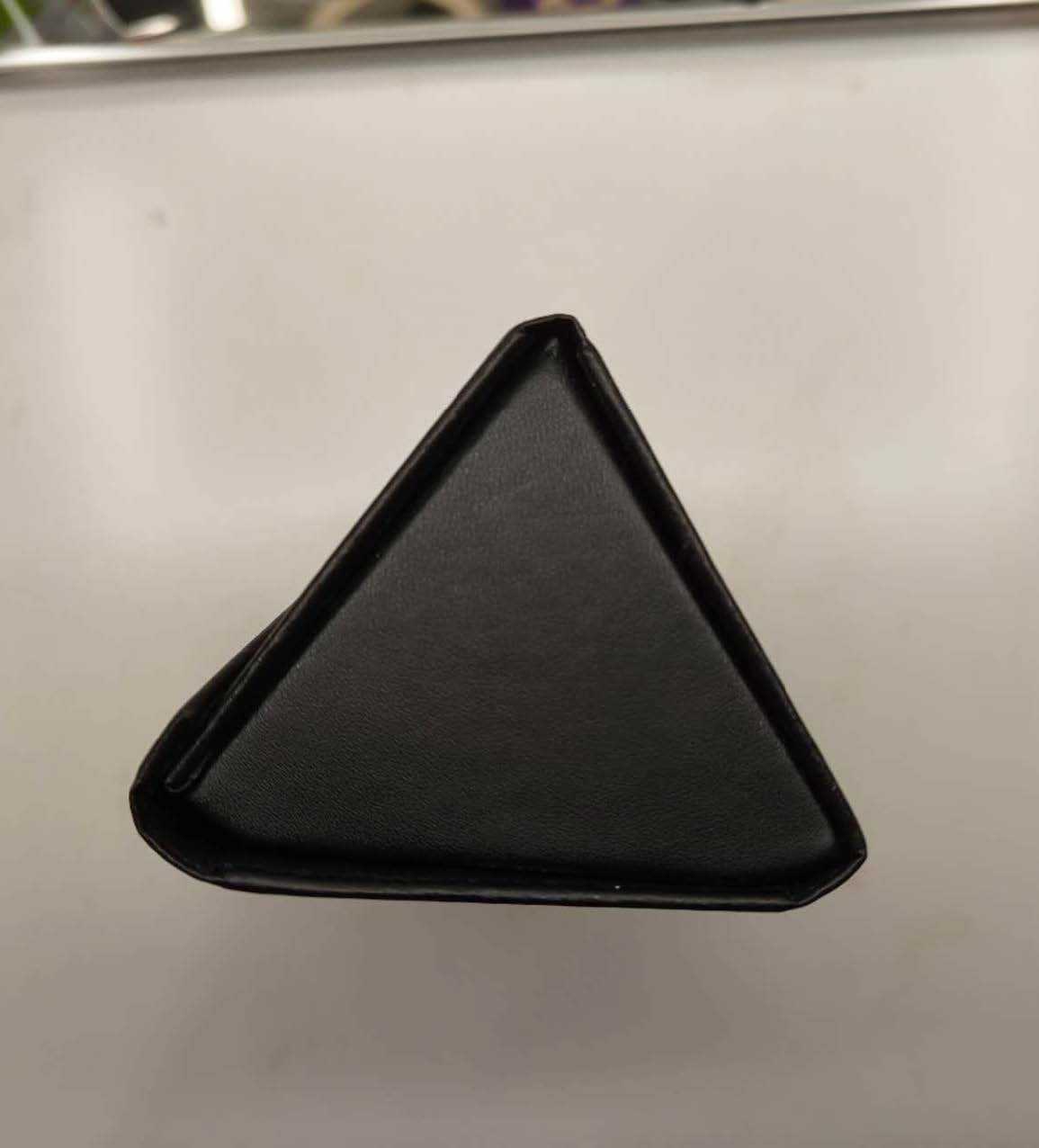 This is a side shot image of a glasses container